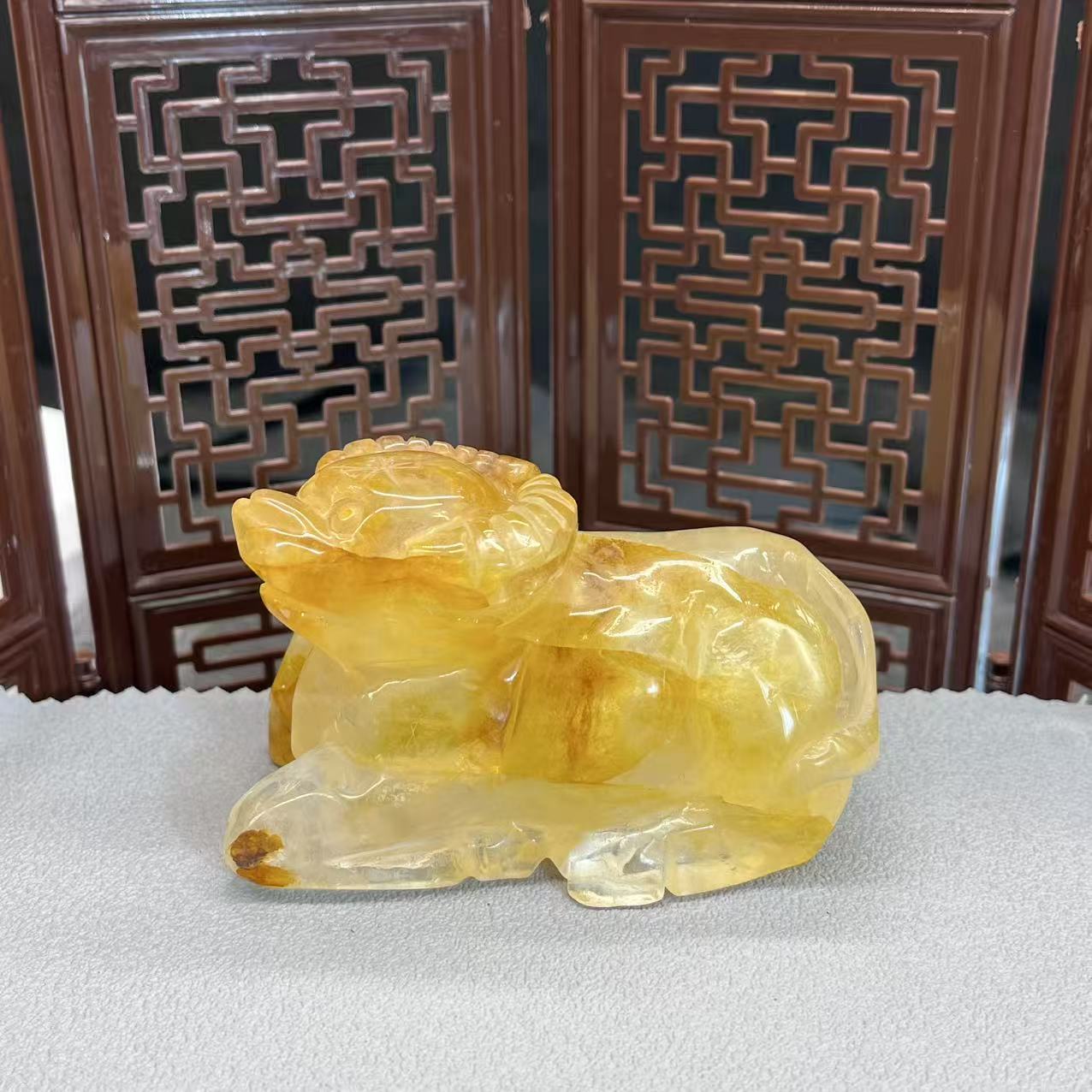 Natural golden healer cow carving