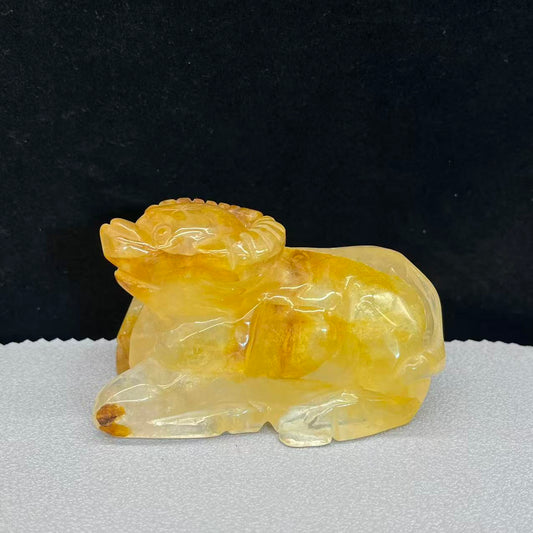 Natural golden healer cow carving