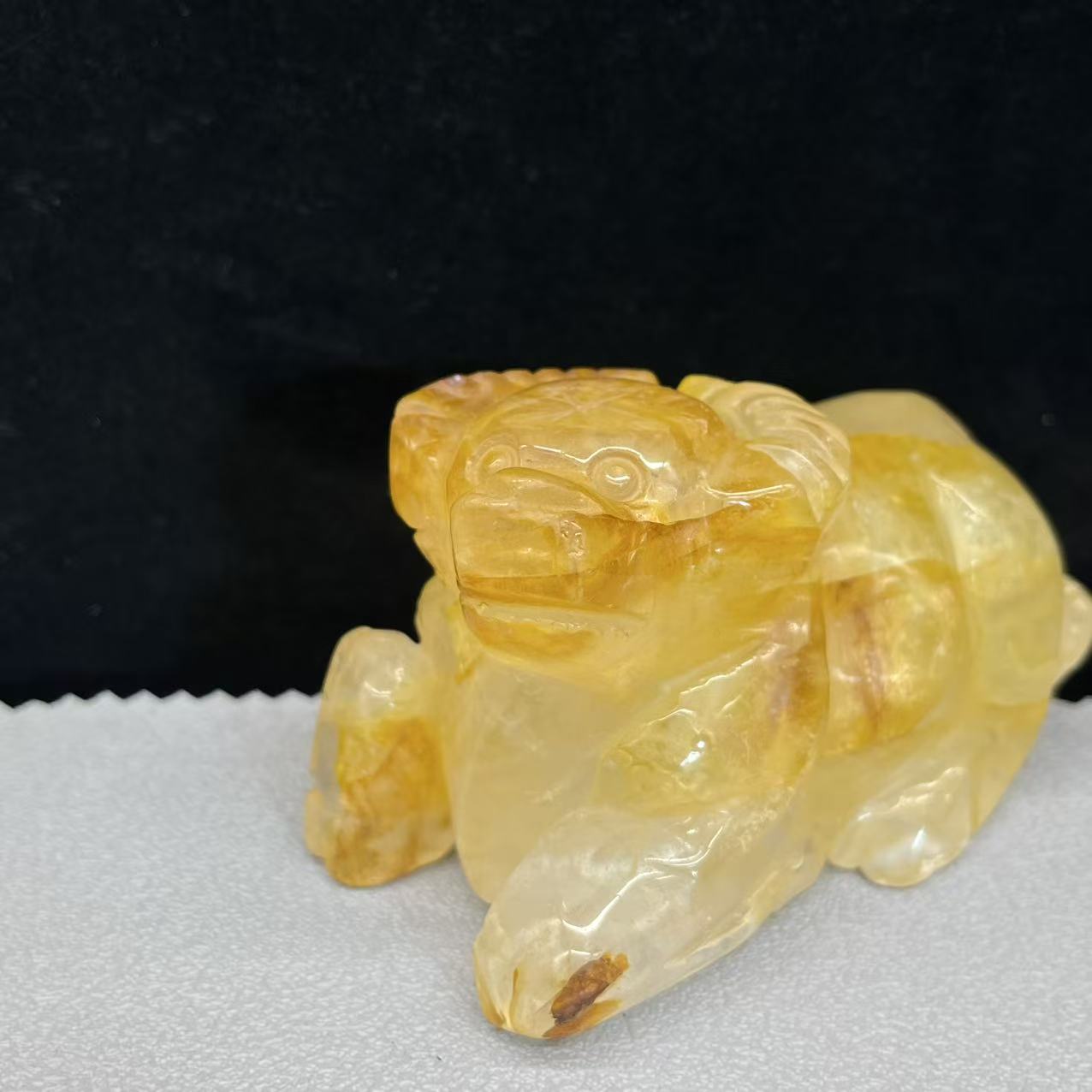 Natural golden healer cow carving