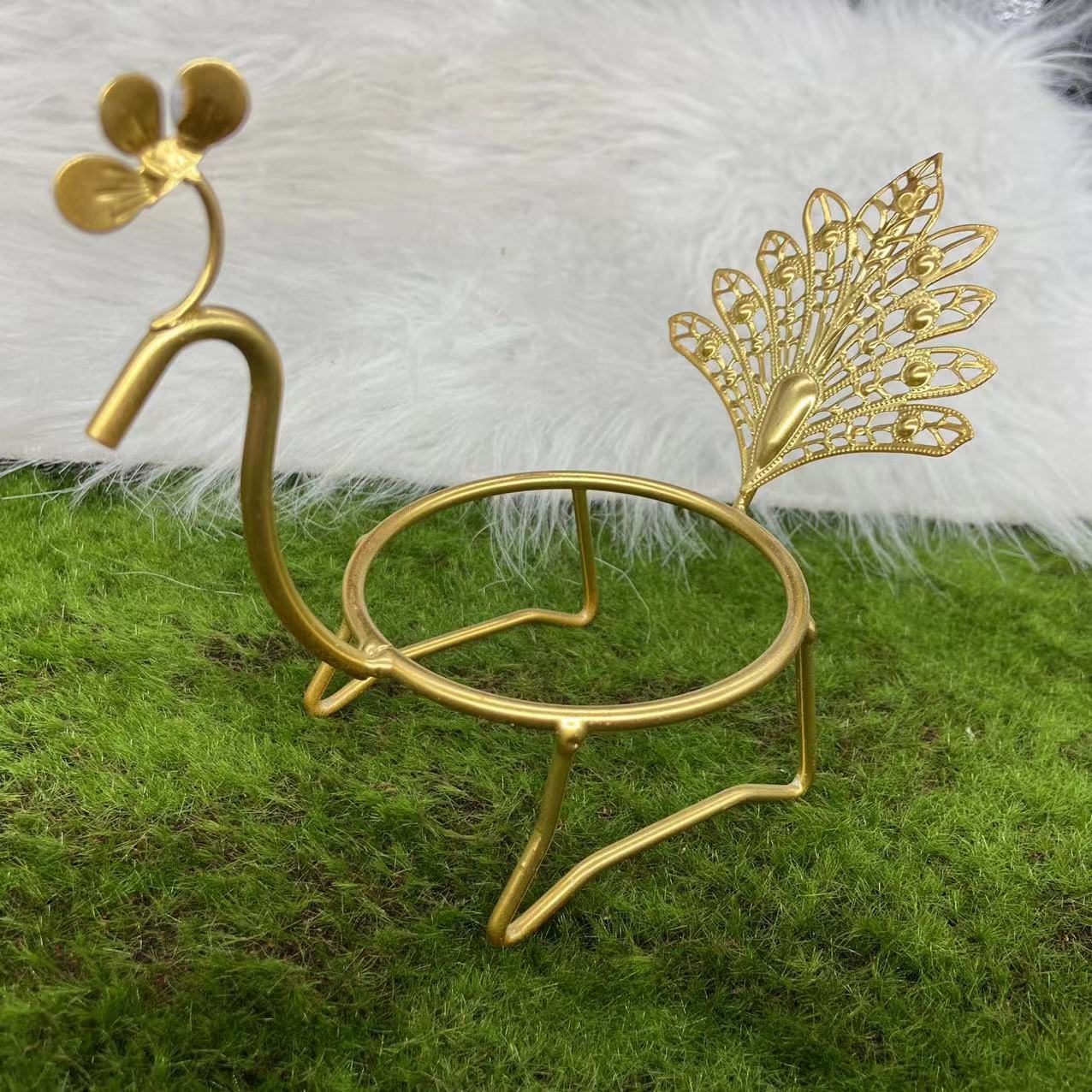 Peacock sphere stand