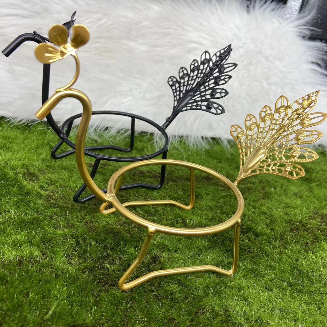 Peacock sphere stand