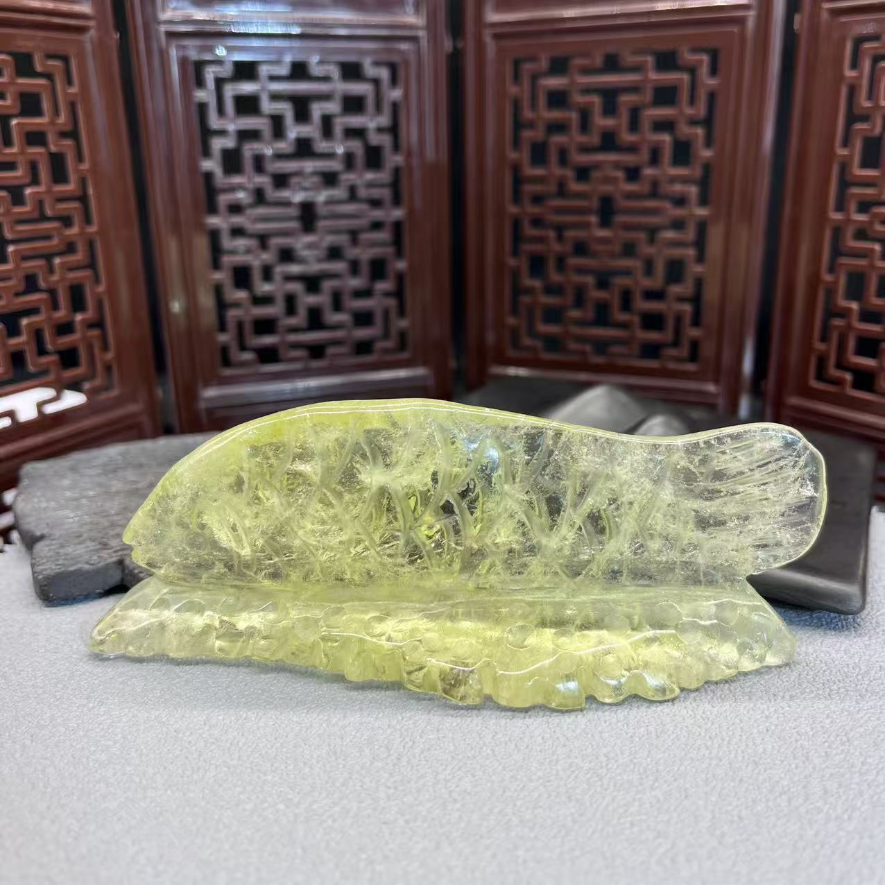 Natural citrine sphere carving of koi