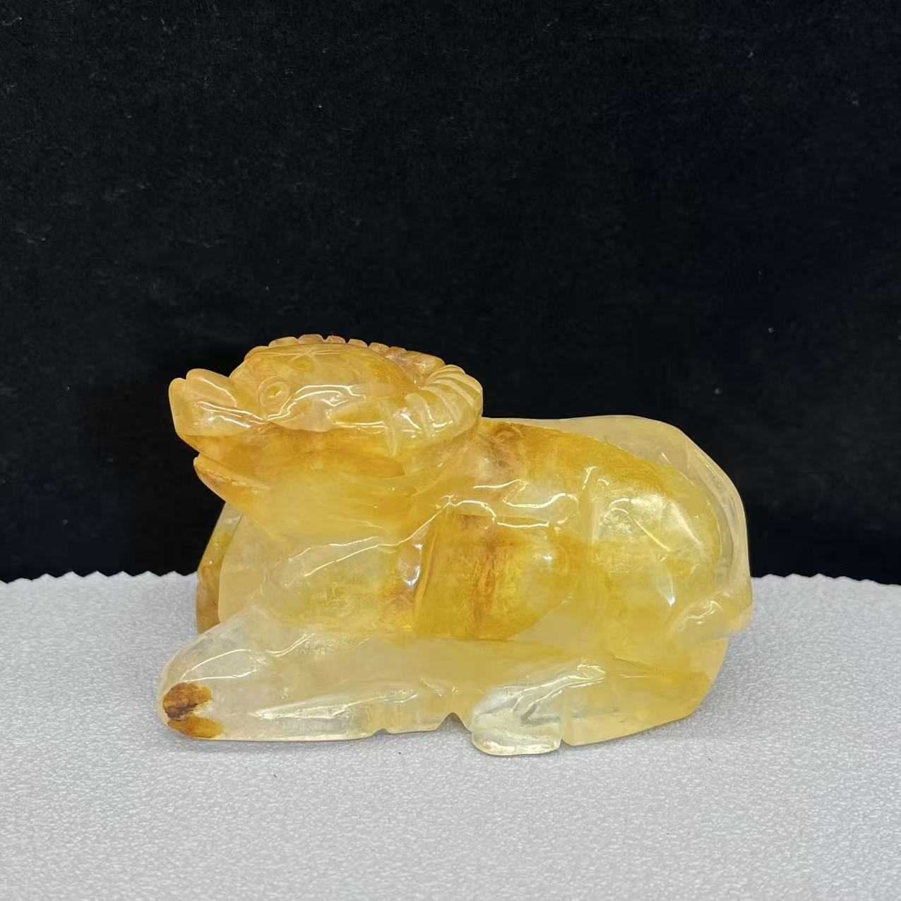 Natural golden healer cow carving