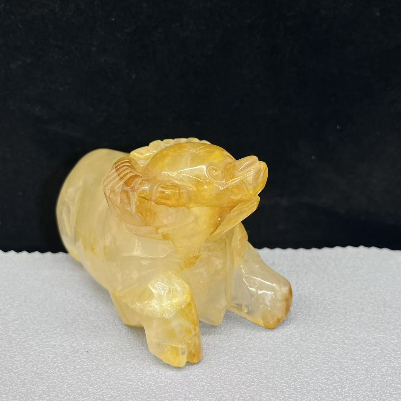 Natural golden healer cow carving